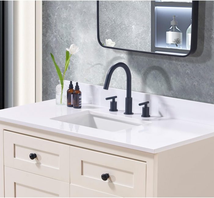 Stylish bathroom vanity with mirror above sleek sink.