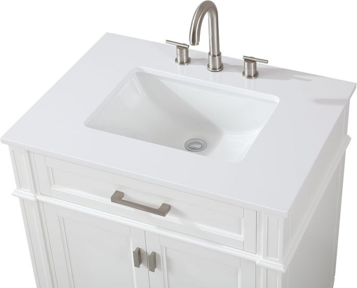 White bathroom vanity with sink and faucet, modern aesthetic.