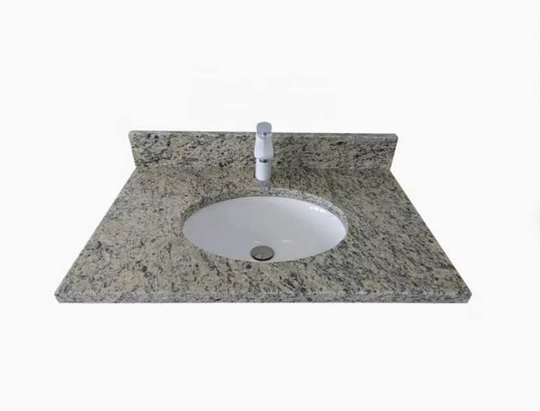 A granite sink with a sleek white faucet.