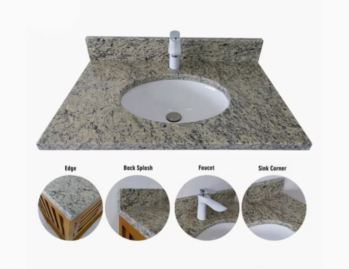 A bathroom sink featuring four distinct granite types.