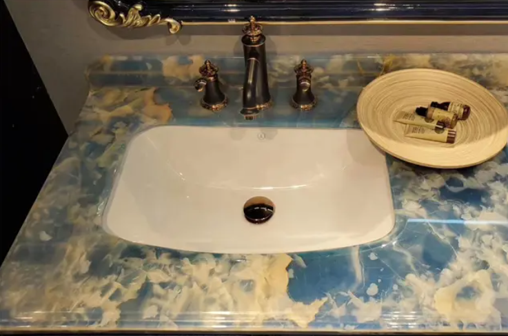 Marble countertop with two bowls, showcasing elegant design.